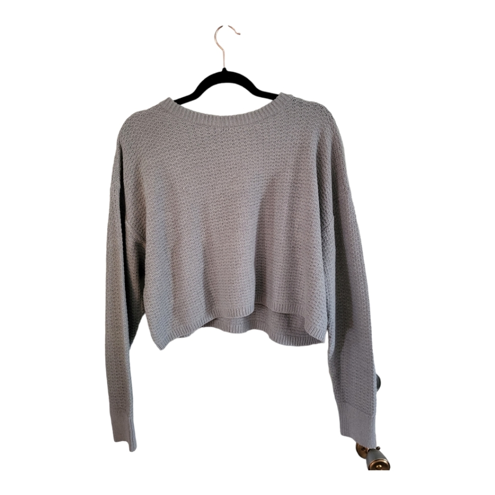 Abount short waisted knit sweater.